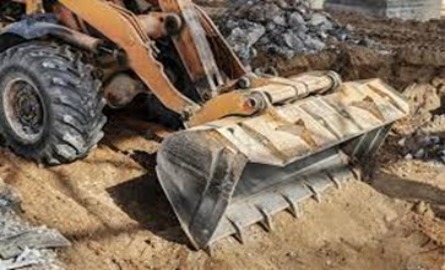 Image of bulldozer in landfill